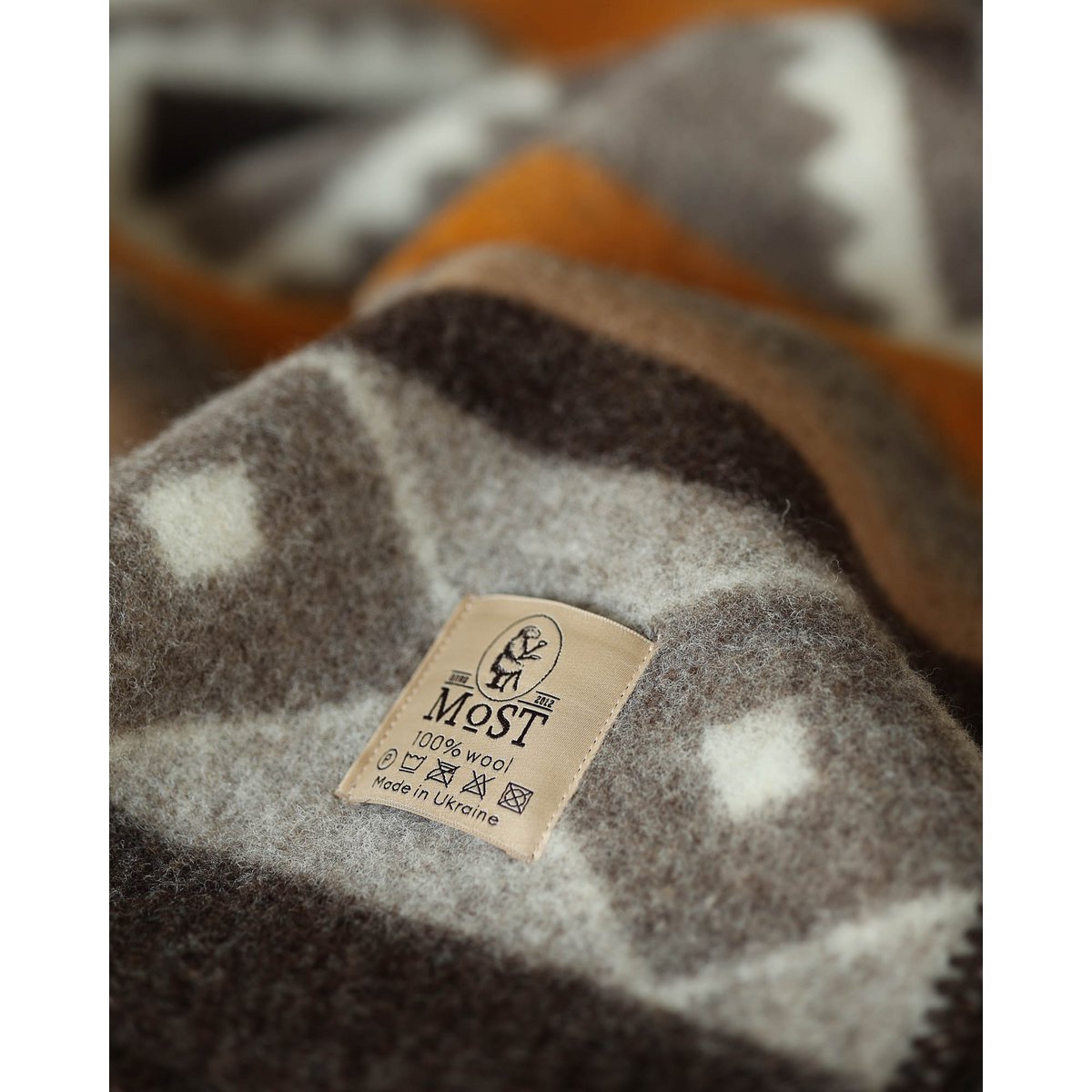 MoST Blankets - Wollen beddeken TRIBE - eenpersoons - brons